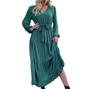 Elegant dark green V-neck long sleeve tiered dress with button detail and waist tie