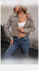 Close-up of a women's cropped plaid jacket with lapel collar and chest flap pockets