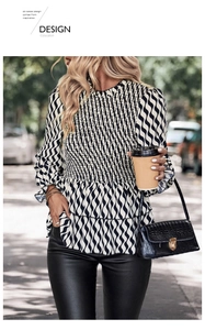 Detail of smocked chest design and ruffled peplum on black and white striped shirt