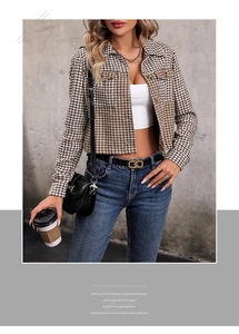 Detail of a brown houndstooth cropped jacket with lapels and dual front pockets