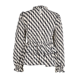 Detail view of high ruffle neck with teardrop button back closure on striped blouse