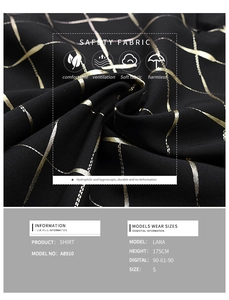 Detail of black V-neck shirt fabric with metallic geometric pattern and soft texture