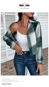 Close-up of green and white plaid pattern texture on a casual cropped jacket