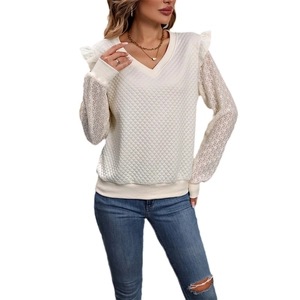 Women's V-neck long sleeve top in cream with quilted texture and lace ruffle sleeves