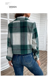 Back view of a green and white plaid flannel shacket featuring a relaxed drop shoulder fit