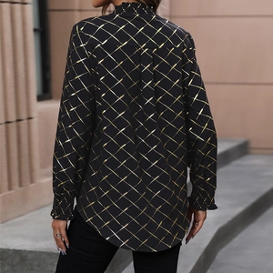 Women's black V-neck shirt with gold metallic lattice print and ruffle collar back view
