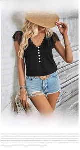 Detail of elegant V-neckline with delicate lace trim and white contrast buttons on top