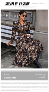 Detail of V-neck floral print dress with tiered skirt on a street setting bench
