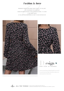 Detail of the ruffle cuffs and floral print on a long-sleeved spring dress