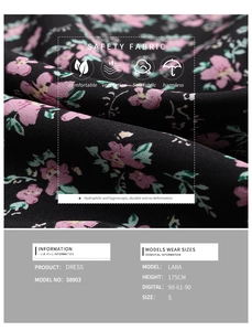 Close-up of soft breathable black floral dress fabric with pink and green patterns