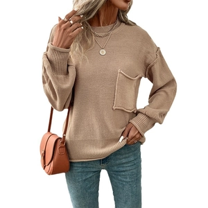 Women's crew neck khaki knit sweater with long sleeves and front pocket detail
