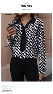 Detail of contrast lapel and chain print pattern on a long-sleeved women shirt