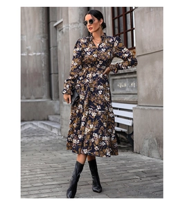 Detail of floral printed long sleeve dress with ruffle collar and elastic high waist