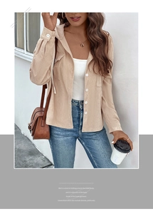Detail of beige corduroy jacket with single-breasted buttons and chest pockets for women