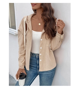 Detail of beige corduroy hooded jacket with white buttons and drawstring for women