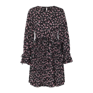 Close-up of black floral chiffon dress showing flared cuffs with ties and pleated hem