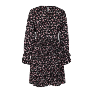 Rear view of floral long sleeve dress showing pleated skirt and ruffled cuffs detail