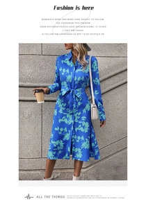 Close-up of royal blue floral shirt dress with lapel collar and waist tie details