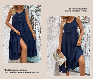 Detail of dark blue sleeveless tiered dress with round neck and front button accents