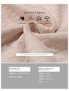 Detail of pink quilted hoodie dress fabric showing breathable and soft texture