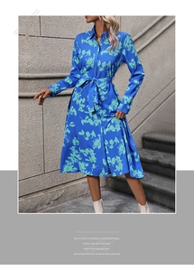 Detail of royal blue floral shirt dress featuring turn-down collar and waist tie