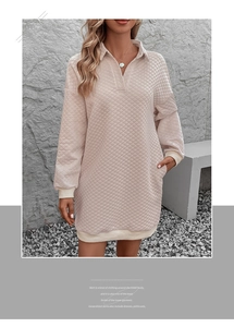 Detail of light pink quilted dress with diamond pattern and soft ribbed collar