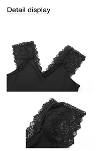 Detailed close-up of V-neck lace patchwork and ribbed knit fabric on a black bodysuit
