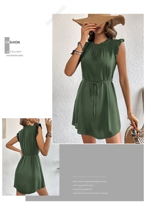 Detail view of dark green sleeveless dress with ruffle stand collar and waist drawstring