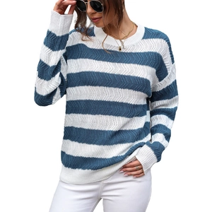 Women's crew neck striped knit sweater with blue and white chevron texture patterns