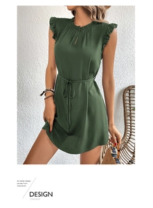 Detail of dark green sleeveless dress featuring ruffled stand collar and teardrop cutout