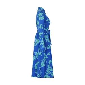 Detail of blue long-sleeve shirt dress with abstract floral print and waist tie belt