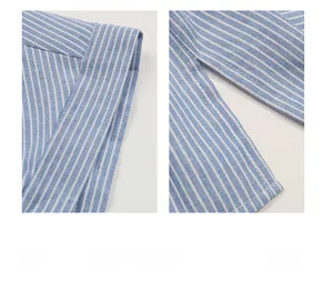 Détail du tissu à rayures bleues et blanches avec fente latérale et ourlet piqué
