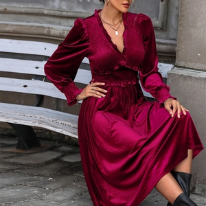 Elegant burgundy velvet maxi dress with V-neck ruffle details and smocked waist design