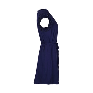 Detail of dark blue sleeveless dress showing ruffle sleeves and matching waist belt