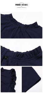 Close-up of ruffled neckline and black round button on navy blue sleeveless dress