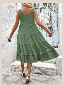 Detailed back view of a sleeveless tiered sage green dress with a triple-layered ruffle skirt
