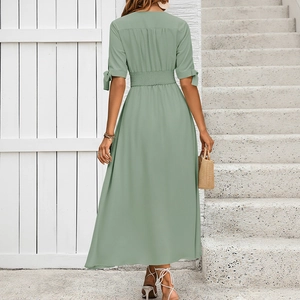 Elegant sage green V-neck midi dress with bow-tie sleeves and elastic high waist