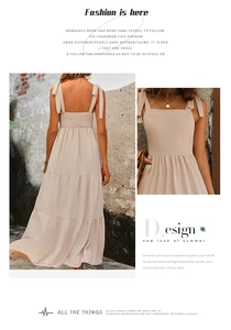 Detail of smocked back design and ribbon shoulder straps on apricot summer maxi dress