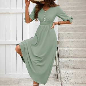 Elegant V-neck sage green midi dress with button detail and bow sleeves for summer