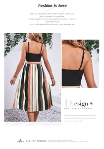 Detail view of the colorful striped pleated skirt and the chic ribbed knit bodice