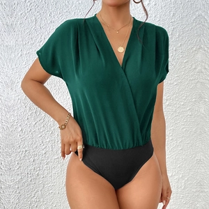 Elegant dark green V-neck wrap bodysuit with short batwing sleeves and black ribbed bottom