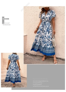 Detail of bohemian floral print dress with V-neckline and drawstring waist detail
