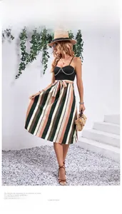 Detail of striped A-line summer dress with pearl chain decor and waist bow tie