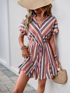 Detail of multi-colored striped summer dress with V-neckline and waist tie design