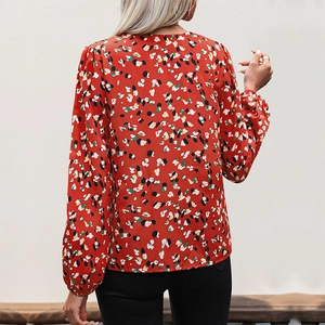 Women's V-neck long sleeve blouse with red floral print and elastic cuffs back view