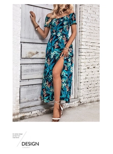Detail of off-shoulder tropical print maxi dress with high slit and floral patterns