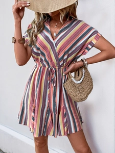 Detail of colorful vertical striped summer dress with V-neck and drawstring waist belt