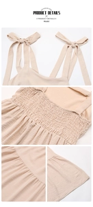 Detail showing the adjustable shoulder ties and elastic smocking back of the beige dress