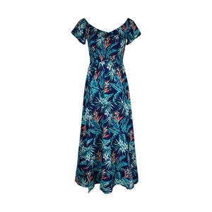 Close-up of tropical palm leaf and floral prints on navy blue summer dress fabric