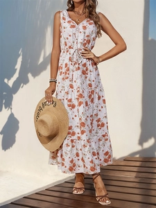 Detail of V-neck sleeveless floral maxi dress with tiered cake skirt and drawstring waist